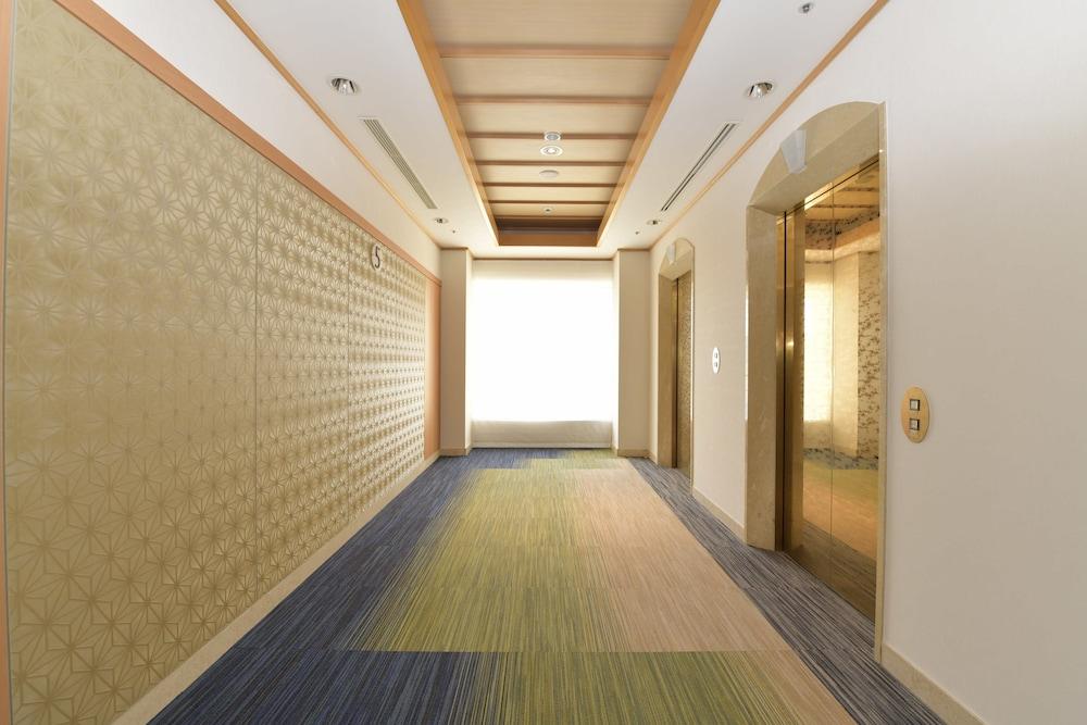 Hotel Port Plaza Chiba Luaran gambar A 3D rendering of a hotel corridor