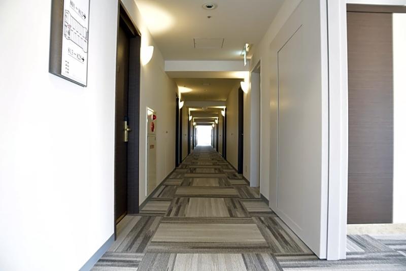 Hotel Port Plaza Chiba Luaran gambar A typical hotel corridor